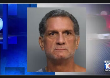 Police believe a Miami-Dade man who reported his father's death as a fall strangled him.